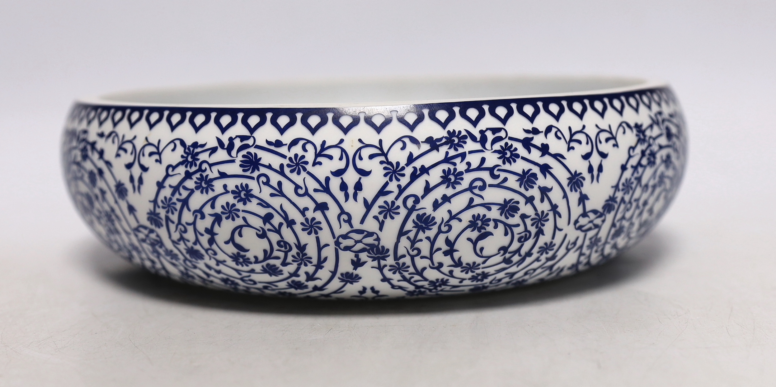 A limited edition Turkish blue and white bowl with certificate, 24cm in diameter